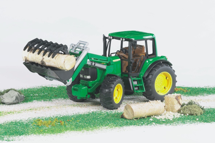 Bruder-Traktor s nakladačem